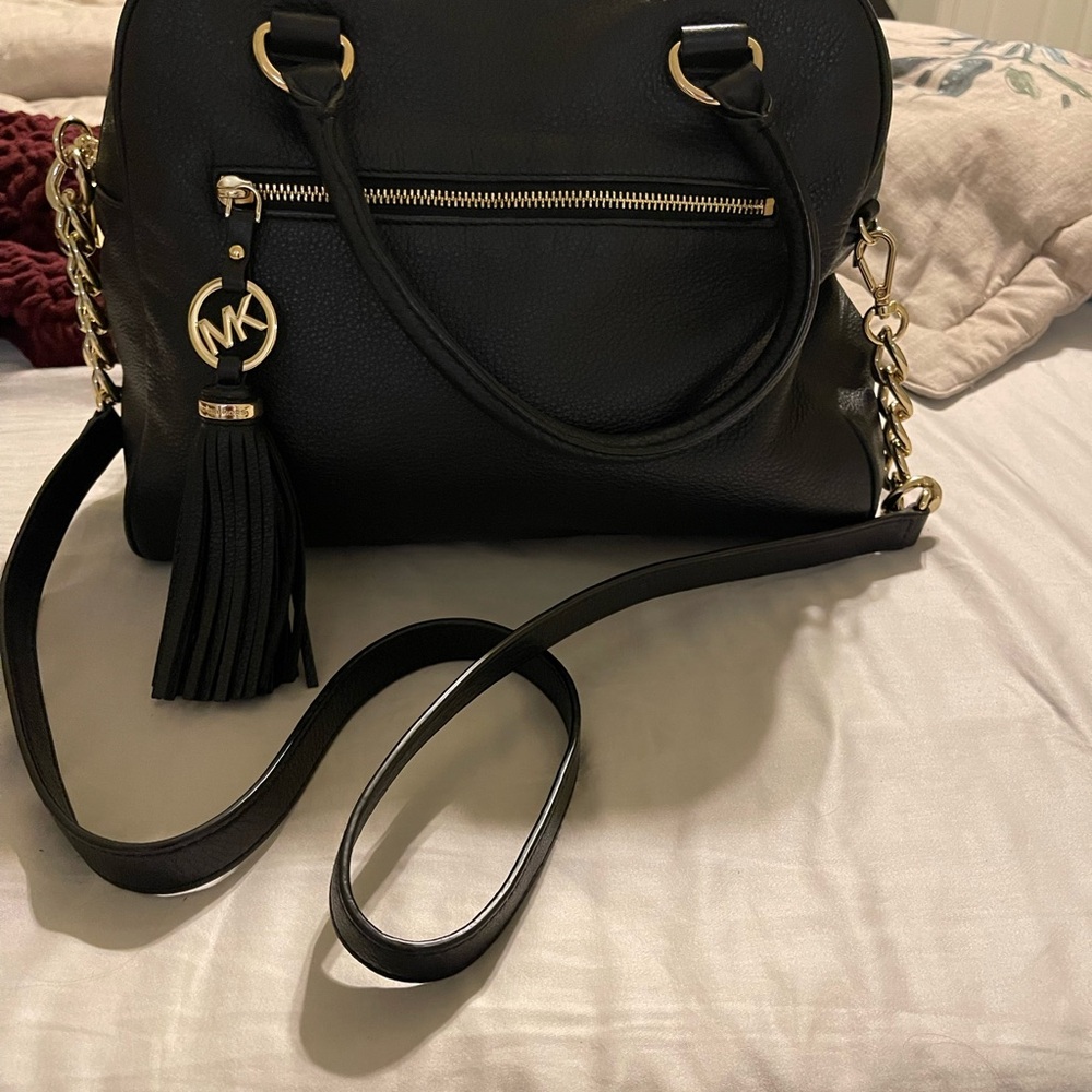 Michael Kors Black and Gold handbag. Nice leather.
